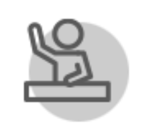 icon person sitting at a desk hand raised