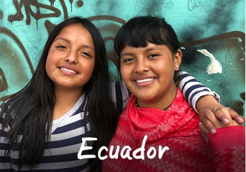 Ecuador | a couple of girls standing next to each other