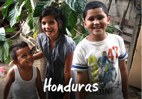 Honduras | a couple of kids standing next to each other