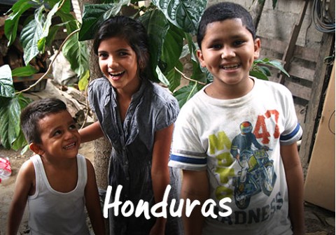 Honduras | a couple of kids standing next to each other