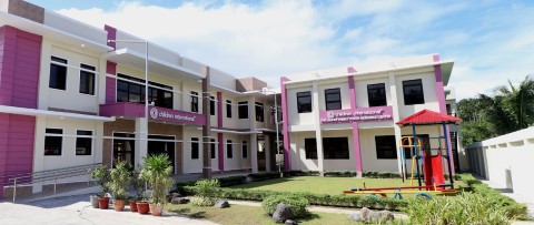 one of our community centers with a playground in front of it