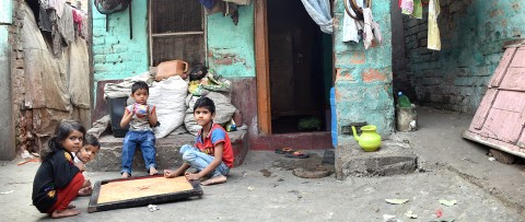 a group of children playing a board game