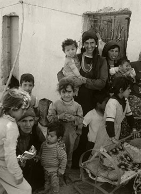 a black and white photo of a group of people