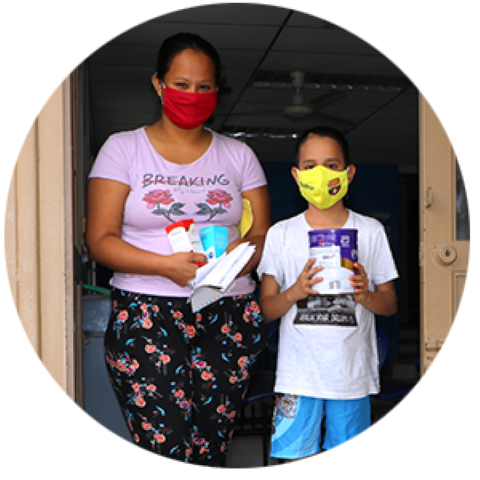 a woman and a child wearing face masks