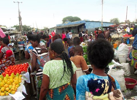 Crowds of mothers and kids converge on the market in Lusaka, Zambia
