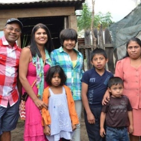Angel More and family visiting sponsored children