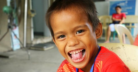 Boy in Philippines being silly 