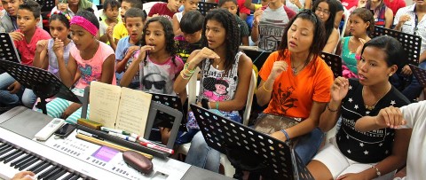 Sponsored kids in Colombia sing in music program