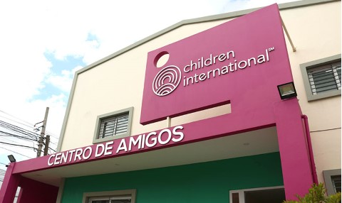 a building with a sign that says children international