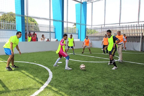 The sports court at the new youth center provides young people with a safe space to play.