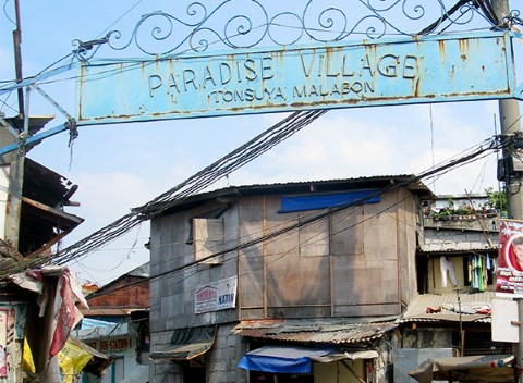 Paradise Village iron arch 