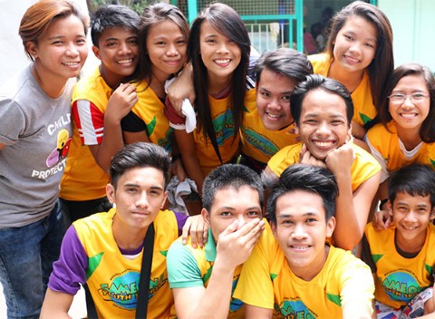 Teens participating in Sports for Development take a group picture