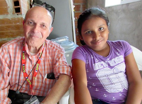 Sponsor Anthony visits with sponsored child Maria 