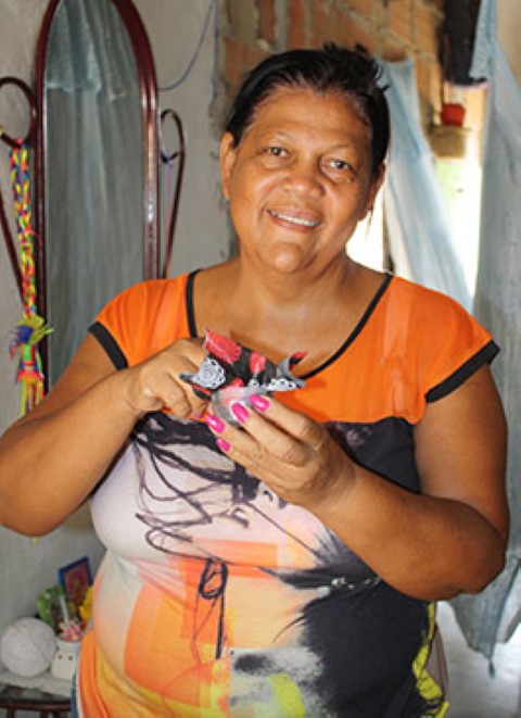 Although Mrs. Carmen teaches others how to recycle and earn extra income, she also practices what she preaches – creating and selling products from “found” materials.