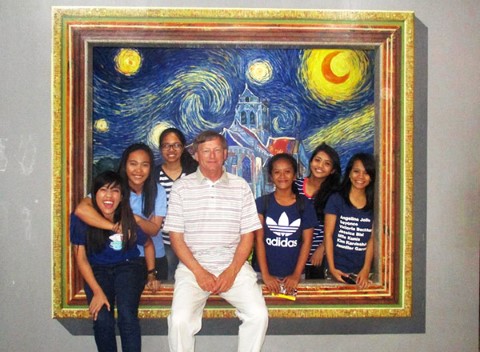 Chris Kent visits a museum with his sponsored kids in the Philippines.