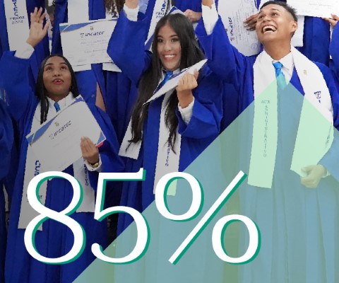 a group of young people wearing graduation gowns and holding diplomas