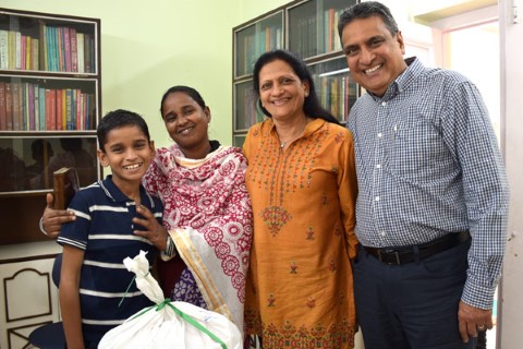 a group smiling to the camera