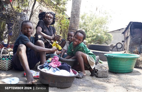 Family works on laundry